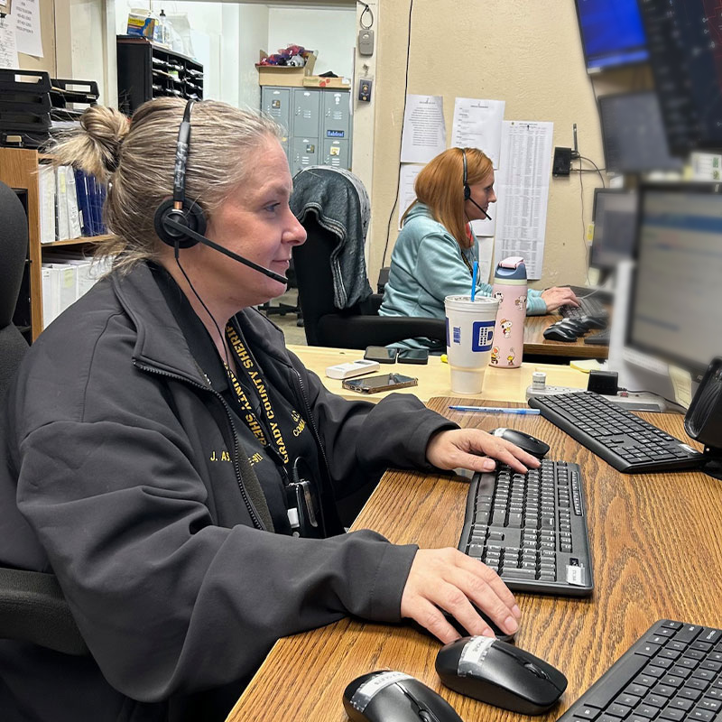 dispatch operator at computer